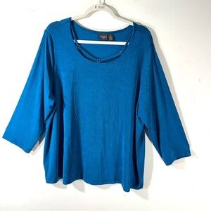 Chico’s Travelers Slinky Knit blue top cut out neckline